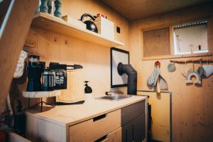 a small kitchen with a sink in a room at Posed Rikitan in Spálené Poříčí