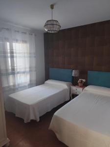 Posteľ alebo postele v izbe v ubytovaní Casa El Molino Del Pozo De Los Frailes