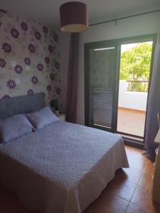 Posteľ alebo postele v izbe v ubytovaní Casa El Molino Del Pozo De Los Frailes