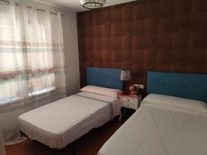 Posteľ alebo postele v izbe v ubytovaní Casa El Molino Del Pozo De Los Frailes