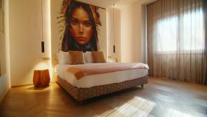 Postel nebo postele na pokoji v ubytování Hotel Mealba