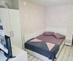 Postel nebo postele na pokoji v ubytování AmA