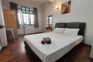 Postel nebo postele na pokoji v ubytování Hotel Check Inn 2