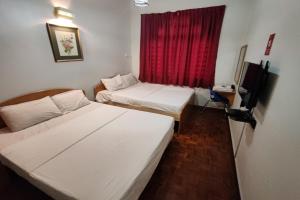 Postel nebo postele na pokoji v ubytování Hotel Check Inn 2