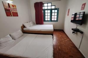Postel nebo postele na pokoji v ubytování Hotel Check Inn 2