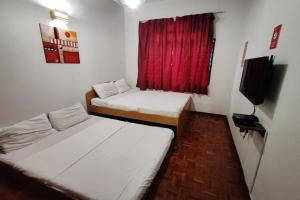 Postel nebo postele na pokoji v ubytování Hotel Check Inn 2