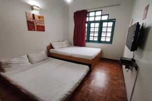 Postel nebo postele na pokoji v ubytování Hotel Check Inn 2