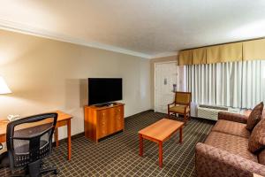 TV a/nebo společenská místnost v ubytování Motel 6-Alvin, TX