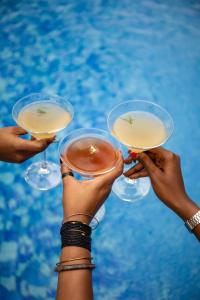 a group of people holding up wine glasses at Eagle View Golf in Kigali