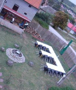 an aerial view of a group of tables in a yard at Chrám Ticha in ľubá +35 photos