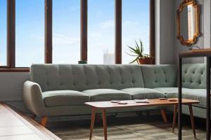 Χώρος καθιστικού στο Breathtaking City View 1 Bed Stylish & Serene
