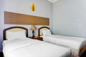 Fotografie z fotogalerie ubytování Townhouse Oak Syariah Hotel Binjai v destinaci Medan + 20 fotografií