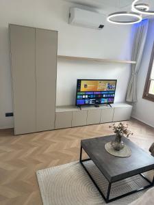 TV a/nebo společenská místnost v ubytování Casa Cabini Piave