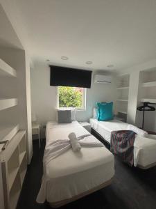 Posteľ alebo postele v izbe v ubytovaní Apartamento Torre Yago primera linea playa Benidorm con Wi-Fi & AC