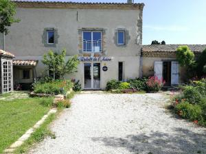 a building with a sign on the front of it at la cassignolette in Castelnaudary
