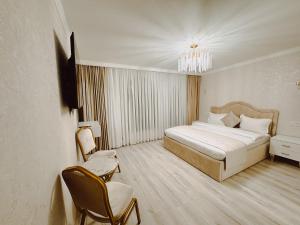 Voodi või voodid majutusasutuse Old Yerevan Boutique Hotel toas