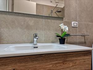 Koupelna v ubytování Cortiletto + 11 fotografií