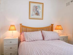 Postel nebo postele na pokoji v ubytování Dymchurch Bungalow