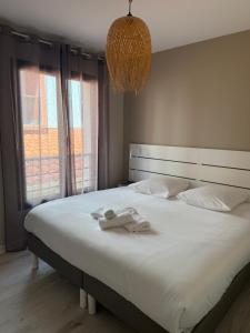 Postel nebo postele na pokoji v ubytování Hotel Aquarius