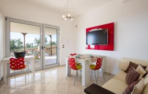 Televisyen dan/atau pusat hiburan di Amazing Home In Belmonte Calabro