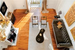an overhead view of a living room with a guitar on the floor at Luxury Duplex 2BR Panoramic Sea View Monaco in Beausoleil