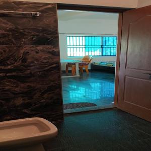 Koupelna v ubytování Arundekar Home Stay In 3 Minutes Walk Beach AC Room