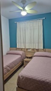 Postel nebo postele na pokoji v ubytování Apartamento 2ª Línea-Oropesa del Mar