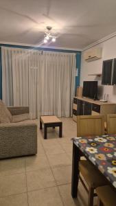 TV a/nebo společenská místnost v ubytování Apartamento 2ª Línea-Oropesa del Mar