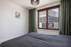 Postel nebo postele na pokoji v ubytování ZWIRN Loft - New Design Stay near Nivy & DownTown