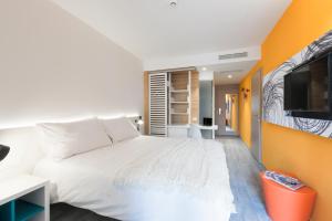 Cama ou camas em um quarto em Pharos Hvar Bayhill Hotel