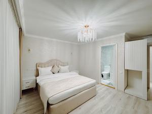 Voodi või voodid majutusasutuse Old Yerevan Boutique Hotel toas