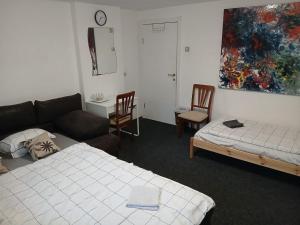 Voodi või voodid majutusasutuse Smart hostel toas