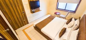 Postel nebo postele na pokoji v ubytování Hotel Nova Viva
