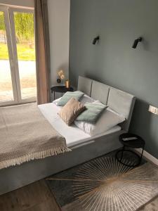 Postel nebo postele na pokoji v ubytování Pokoje I Apartamenty Polna 19