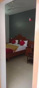 Letto o letti in una camera di Tn27callingkrishholiday