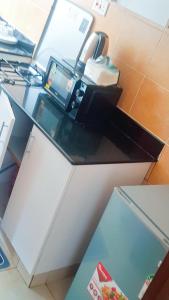 Kuchyň nebo kuchyňský kout v ubytování Beleza Smart Homes + 3 fotografie