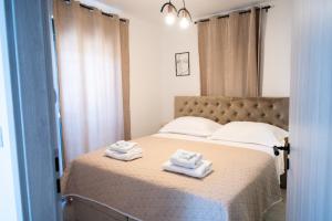Postel nebo postele na pokoji v ubytování Villa Marko + 45 fotografií
