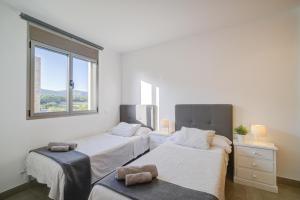Postel nebo postele na pokoji v ubytování Villa Ca'n Tugores by Rentallorca