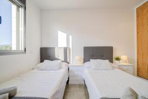 Postel nebo postele na pokoji v ubytování Villa Ca'n Tugores by Rentallorca