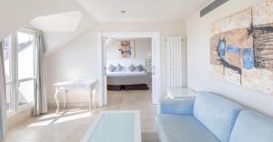 Postel nebo postele na pokoji v ubytování Gran Hotel Suances