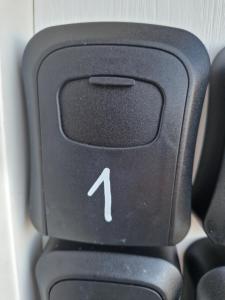 a black computer keyboard with a white arrow on it at penzion U losa in Spořice