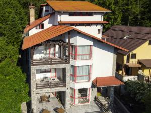 an aerial view of a house with a roof at Roberto Hotel in Sinaia