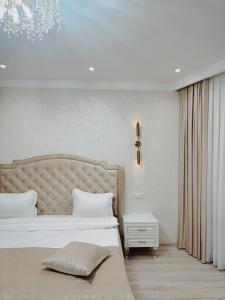 Voodi või voodid majutusasutuse Old Yerevan Boutique Hotel toas
