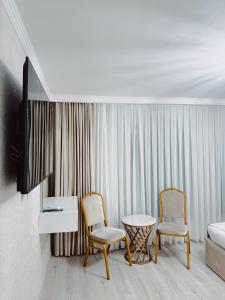 Televiisor ja/või meelelahutuskeskus majutusasutuses Old Yerevan Boutique Hotel