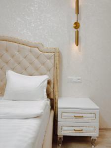 Voodi või voodid majutusasutuse Old Yerevan Boutique Hotel toas