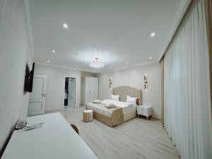 Voodi või voodid majutusasutuse Old Yerevan Boutique Hotel toas