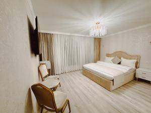 Voodi või voodid majutusasutuse Old Yerevan Boutique Hotel toas