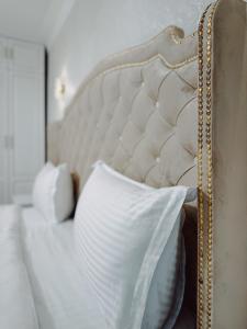 Voodi või voodid majutusasutuse Old Yerevan Boutique Hotel toas