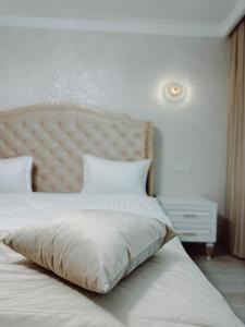 Voodi või voodid majutusasutuse Old Yerevan Boutique Hotel toas