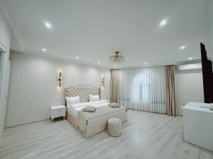 Voodi või voodid majutusasutuse Old Yerevan Boutique Hotel toas